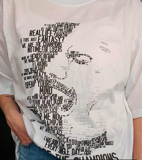 Tamo Harta — dense typographic T-shirt with song lyrics as portrait